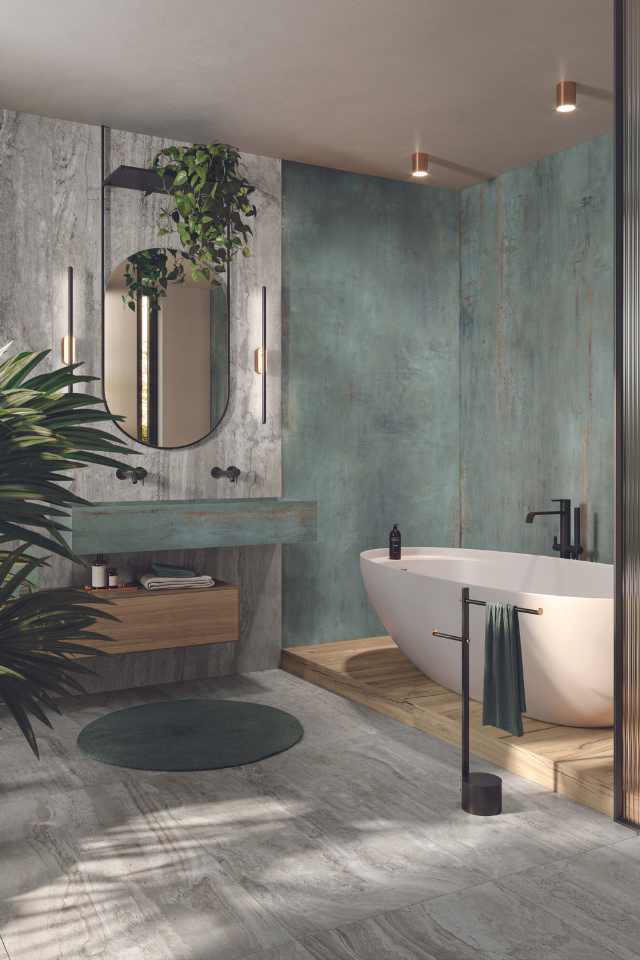 porcelain tile in biophilic designed bathroom with living greenery and natural stone wall and sink